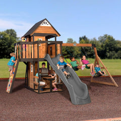 Backyard Discovery Canyon Creek Cedar Wood Swing Set with Wave Slide, Clubhouse, Play Kitchen, Picnic Area, Swings and Rock Wall